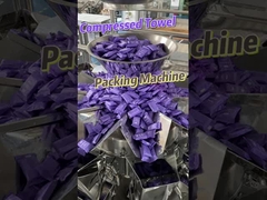 आठ-स्टेशन संपीड़ित तौलिया बैग-फीडिंग पैकेजिंग मशीन